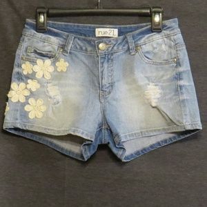 Denim shorts with flower appliques